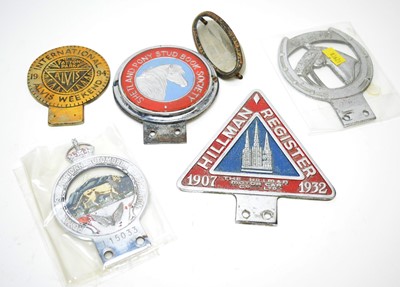 Lot 821 - A selection of car badges.