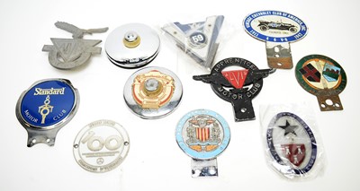 Lot 823 - A collection of car badges; and other items.