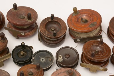 Lot 978 - A collection of 19th/early 20th Century wooden fishing reels.