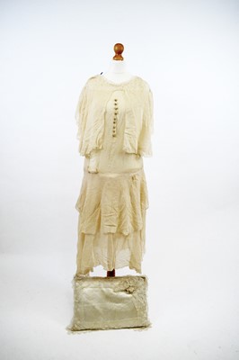 Lot 1219 - 1930s nude chiffon Garcon silhouette wedding dress and silk ring bearing pillow