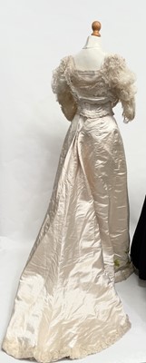 Lot 1199 - An uncommonly fine late Victorian champagne silk wedding ensemble by Heathcote and Co