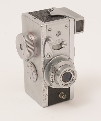 Lot 805 - A Steky III 16mm Subminiature camera; and other related items.
