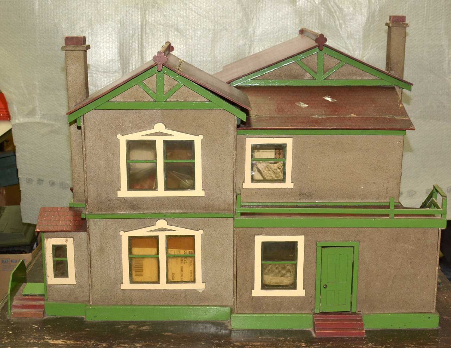 Lot 1143 - A fine early 20th Century doll's house; and doll's furniture.