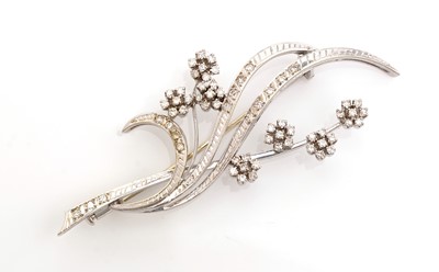 Lot 504 - A diamond and 18ct white gold floral spray brooch