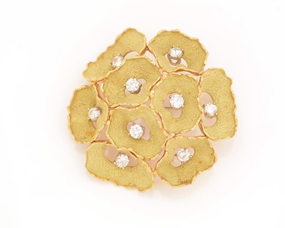 Lot 508 - A 1980s gold and diamond brooch