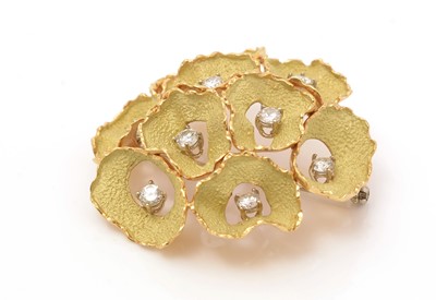 Lot 508 - A 1980s gold and diamond brooch