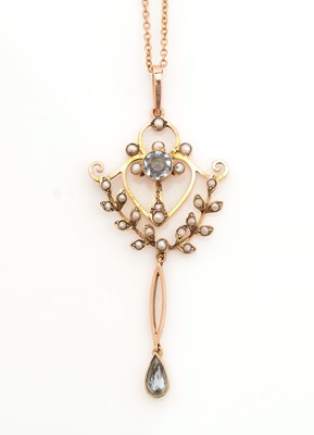 Lot 512 - An Edwardian aquamarine and seed pearl pendant