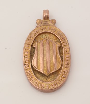 Lot 179 - A 9ct. yellow gold pigeon racing fob medal.