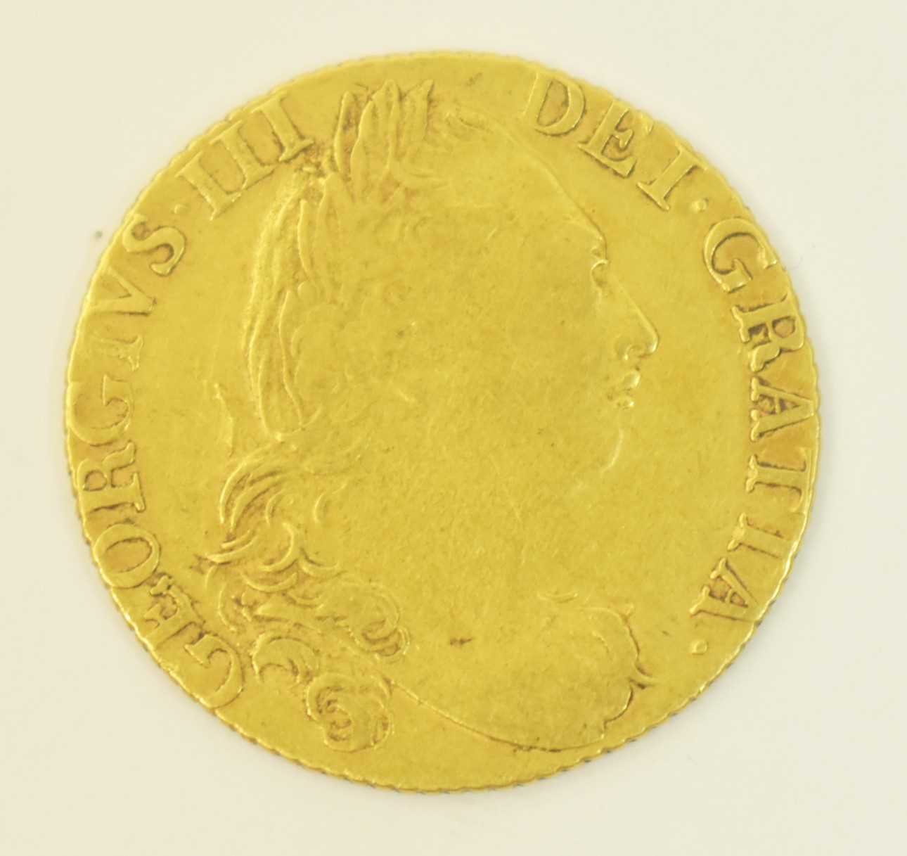 Lot 1031 - A George III gold guinea.