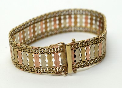 Lot 188 - A tri-colour 9ct gold bracelet