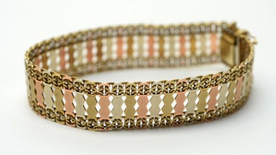 Lot 188 - A tri-colour 9ct gold bracelet