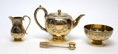 Lot 593 - A fine Victorian silver-gilt bachelor's tea set, by Chawner & Co