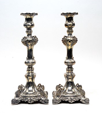 Lot 616 - A pair of 20th Century silver candlesticks