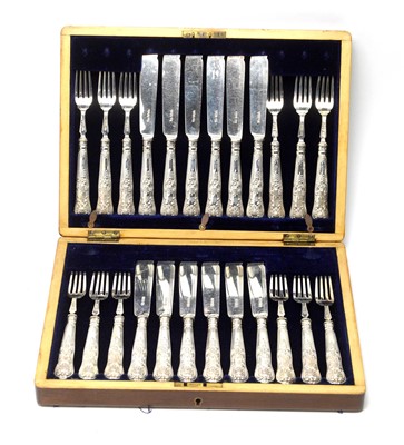 Lot 596 - A set of twelve Victorian silver fruit knives and forks, by Hamilton & Inches