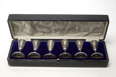 Lot 543 - A set of six George V silver kiddush cups, by Walker & Hall