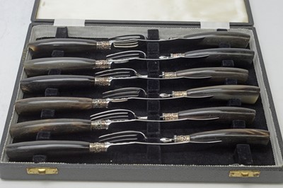 Lot 525 - A set of six steak knives and forks, by Walker & Hall