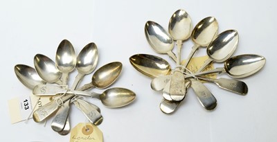 Lot 133 - A set of silver dessert spoons and teaspoons.