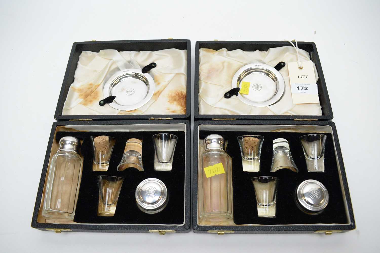 Lot 172 - Two cased silver travelling communion sets.