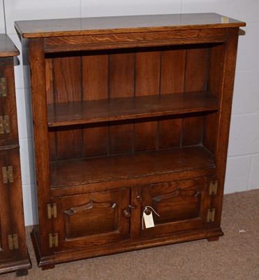 Lot 16 - A small reproduction Georgian style oak cupboard, and another.