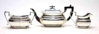 Lot 573 - A three piece Edwardian silver tea service, by James Dixon & Sons Ltd
