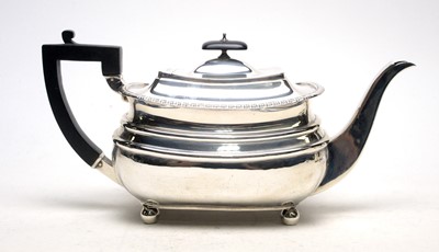 Lot 573 - A three piece Edwardian silver tea service, by James Dixon & Sons Ltd