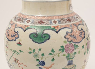 Lot 717 - Pair Chinese Famille Rose vases and covers