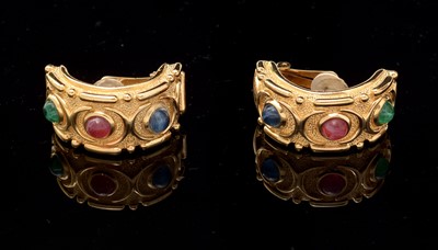 Lot 460 - Christian Dior: a pair of gilt-metal and coloured plastic clip earrings