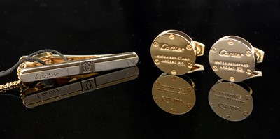 Lot 461 - Cartier cufflinks and tie clip