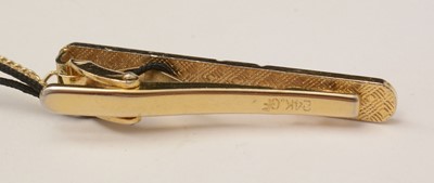 Lot 461 - Cartier cufflinks and tie clip