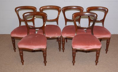 Lot 84 - A set of six Victorian mahogany balloon back dining chairs.