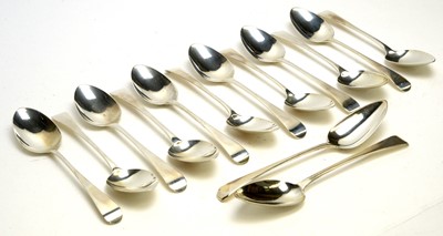 Lot 553 - Twelve Georgian silver tablespoons, various makers