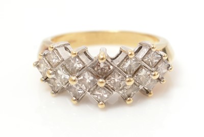 Lot 418 - A diamond dress ring