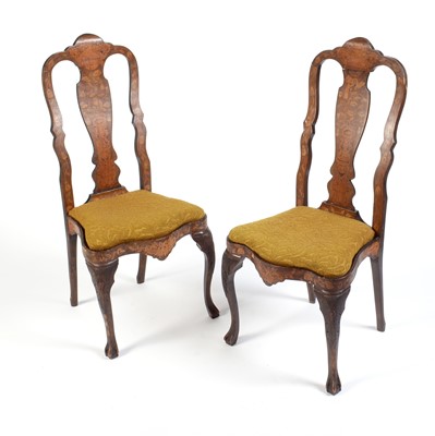 Lot 1080 - Two 18th Century Dutch marquetry high back chairs.