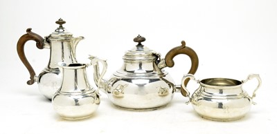 Lot 572 - A George V four piece silver tea service, by Reid & Sons