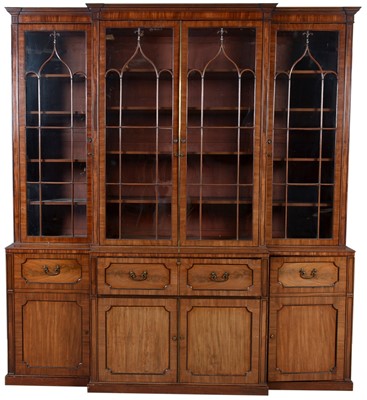 Lot 1299 - A large and impressive George III mahogany breakfront secretaire bookcase