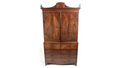 Lot 1061 - A George III mahogany secretaire press