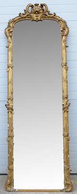 Lot 1021 - A large and ornate Victorian gilt wood wall mirror