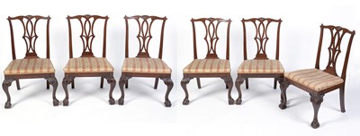 Lot 1064 - A set of six Georgian style mahogany dining chairs