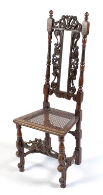 Lot 1066 - A late 17th C carved oak chair.