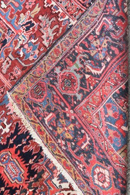 Lot 699 - A Heriz carpet