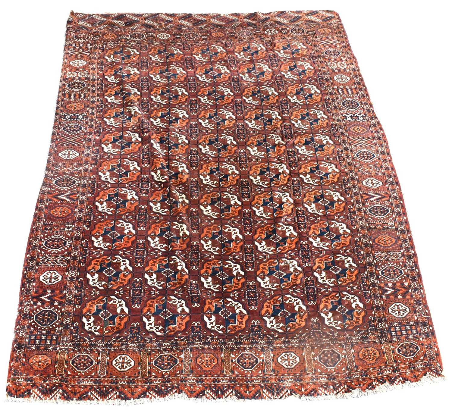 Lot 701 - An antique Tekke Torkman carpet, with five...