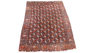 Lot 1094 - An antique Tekke Torkman carpet, with five...