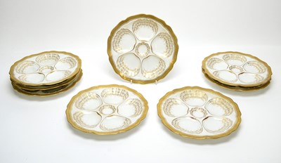 Lot 802 - A set of eight Limoges oyster plates