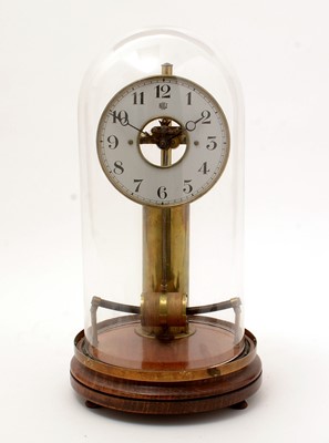 Lot 1003 - Bulle Patent: A dynamo-perpetual electric generated skeleton clock.