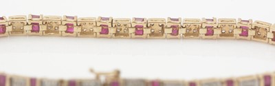 Lot 261 - A ruby and diamond tennis bracelet
