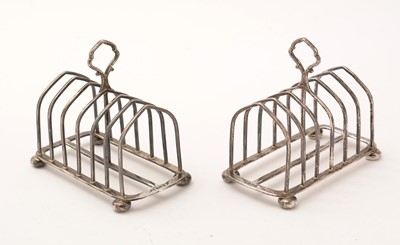 Lot 105 - A pair of silver seven-bar toast racks, by Maxfield & Sons Ltd
