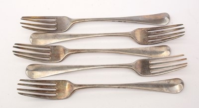 Lot 89 - Five George III silver table forks