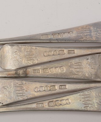 Lot 89 - Five George III silver table forks