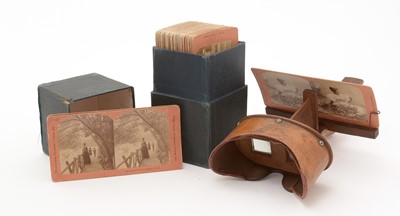 Lot 691 - A collection of stereoscope photographic slides and a viewer