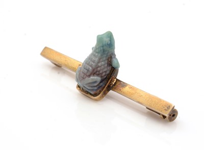 Lot 187 - An apparently Ancient Egyptian frog charm, with letter of authenticity
